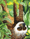sloth hanging upside down in tree